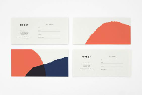 business cards in living coral and navy